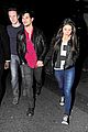 taylor lautner marie avgeropoulos matching jackets london 21